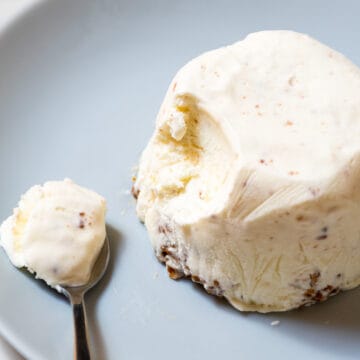 close-up of vanilla ice cream with a spoon near it