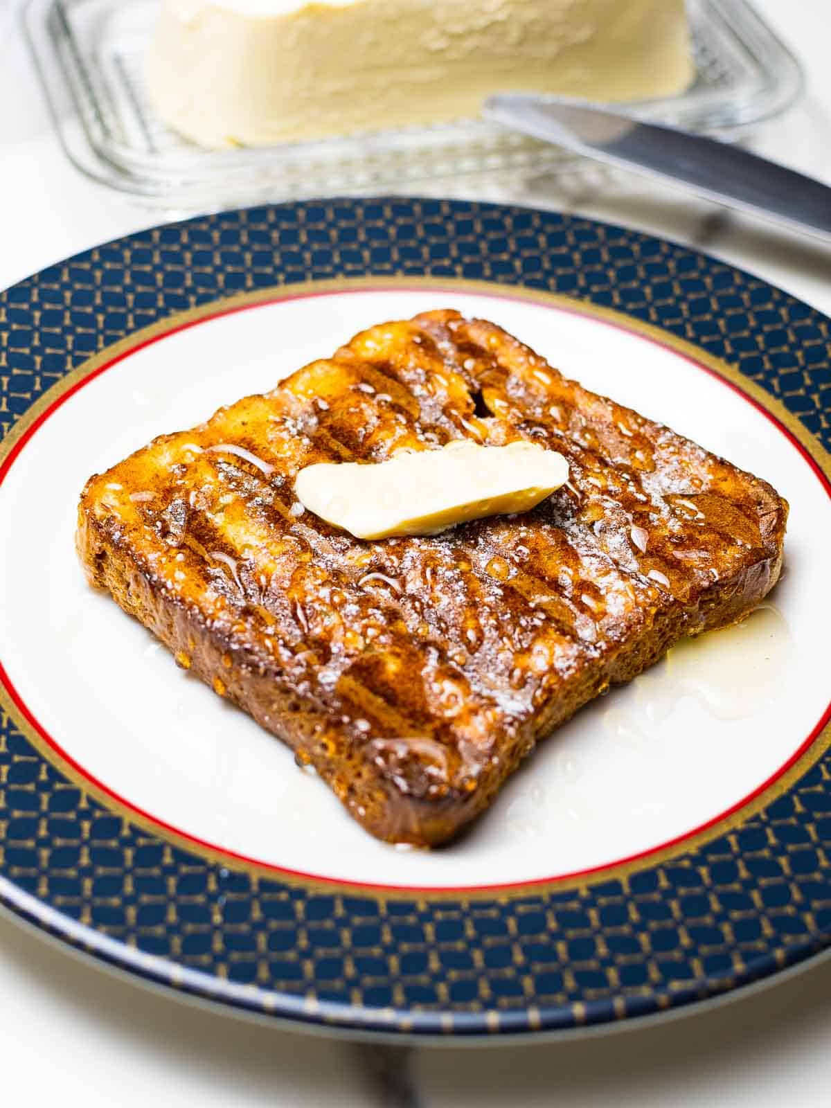 air fryer french toast with honey and sugar on top