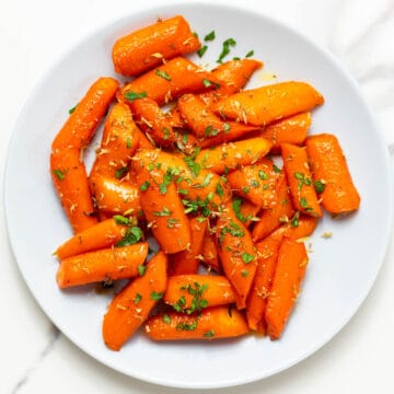 brown sugar honey glazed carrots on a white dish