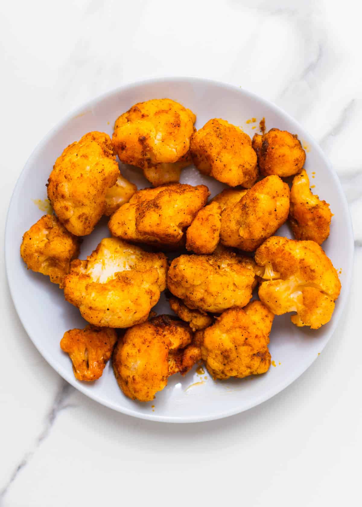 https://www.ambitiousfoodie.com/wp-content/uploads/2023/06/air-fryer-frozen-cauliflower-10.jpg