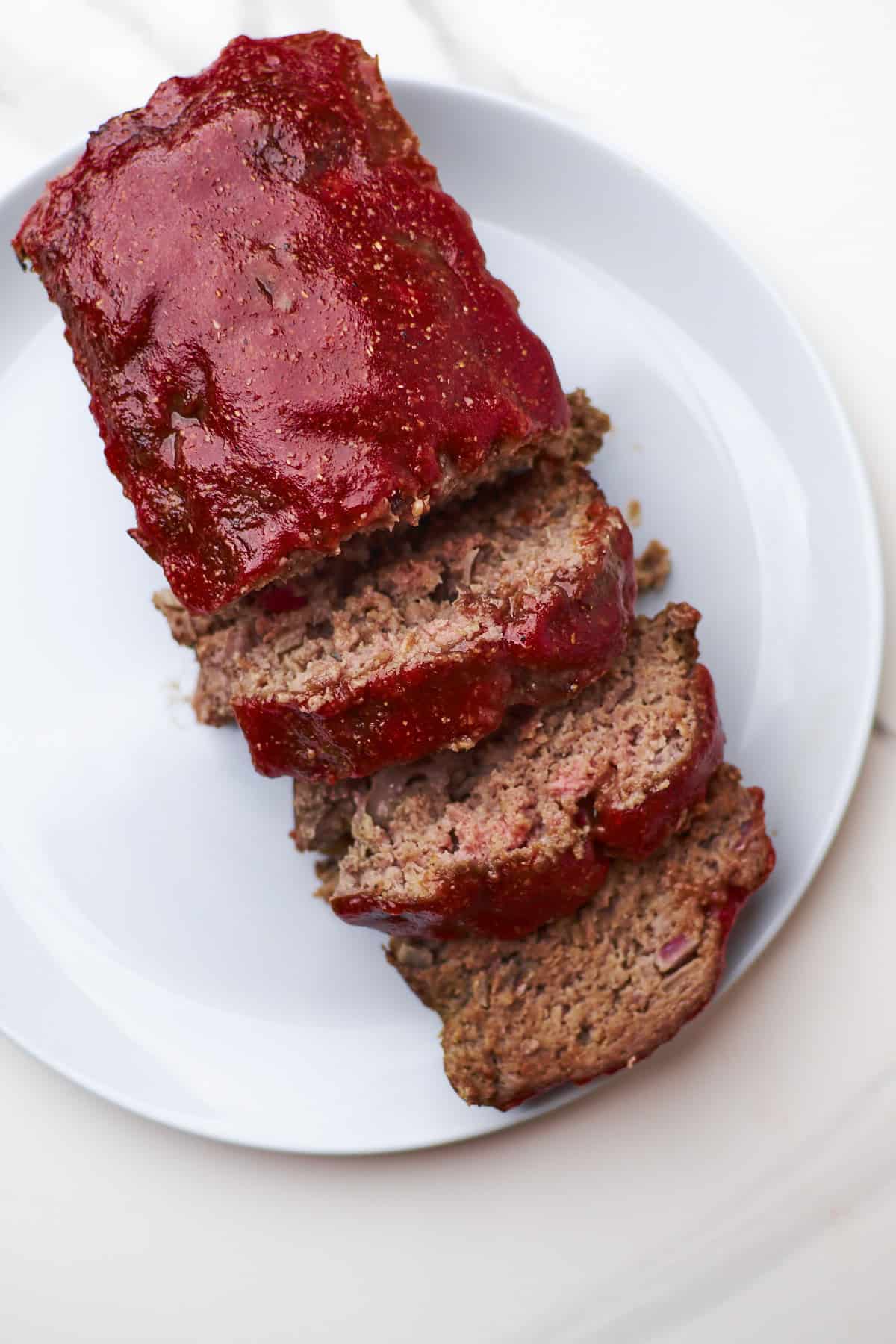 baked glazed meatloaf and sliced.