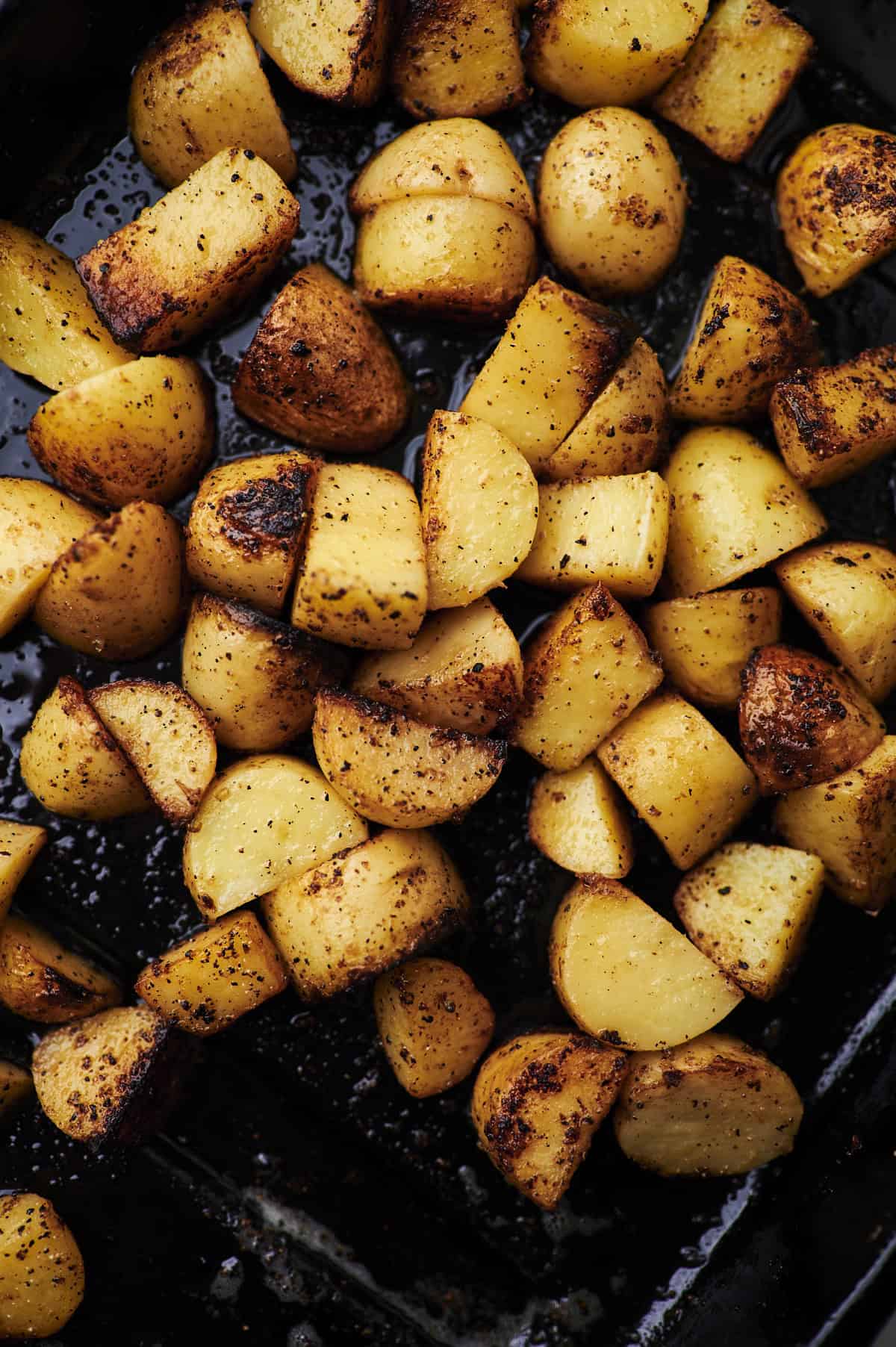 fried baby potatoes on blackstone griddle.