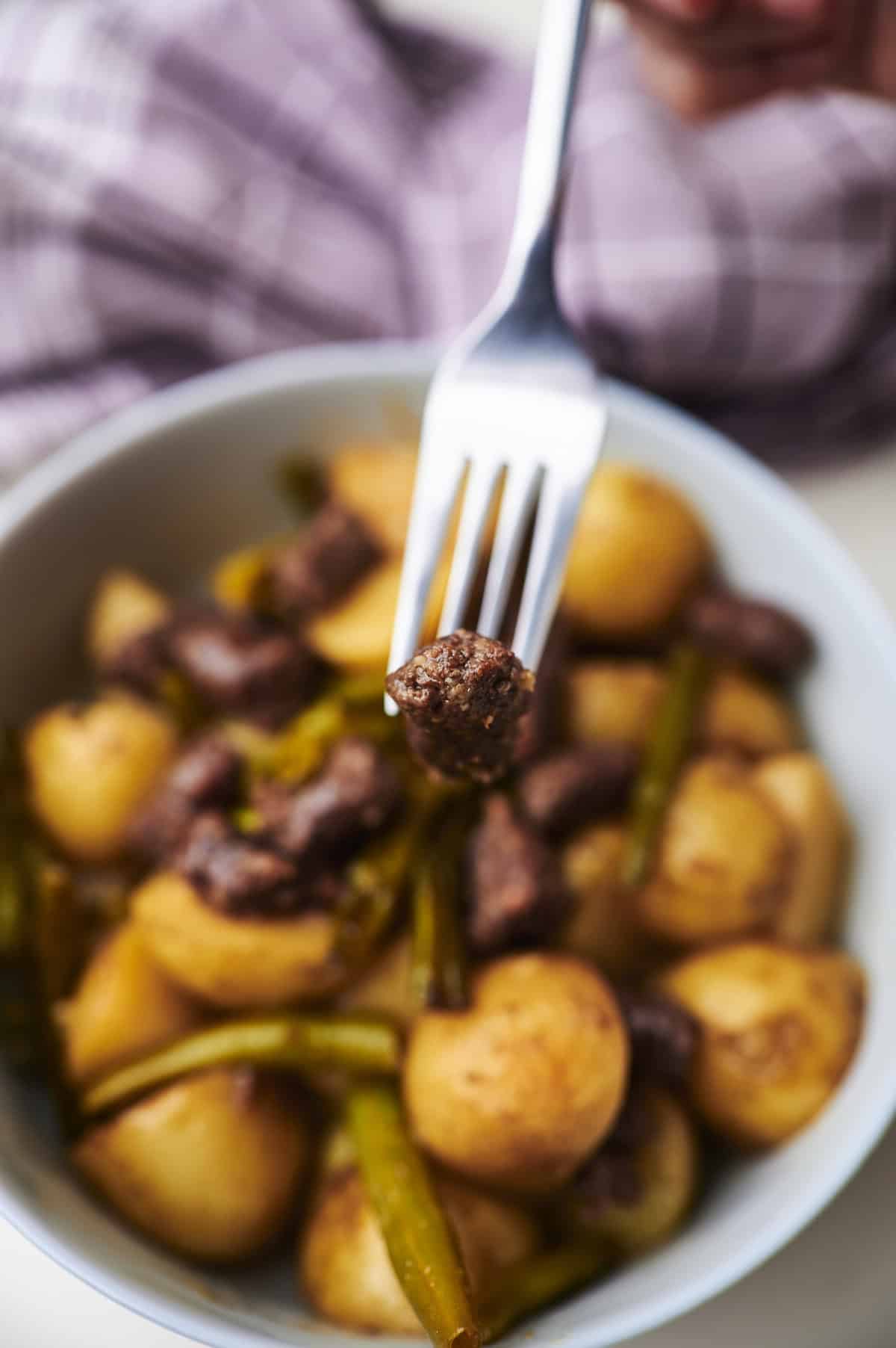 sausage and potatoes with green beans in crockpot