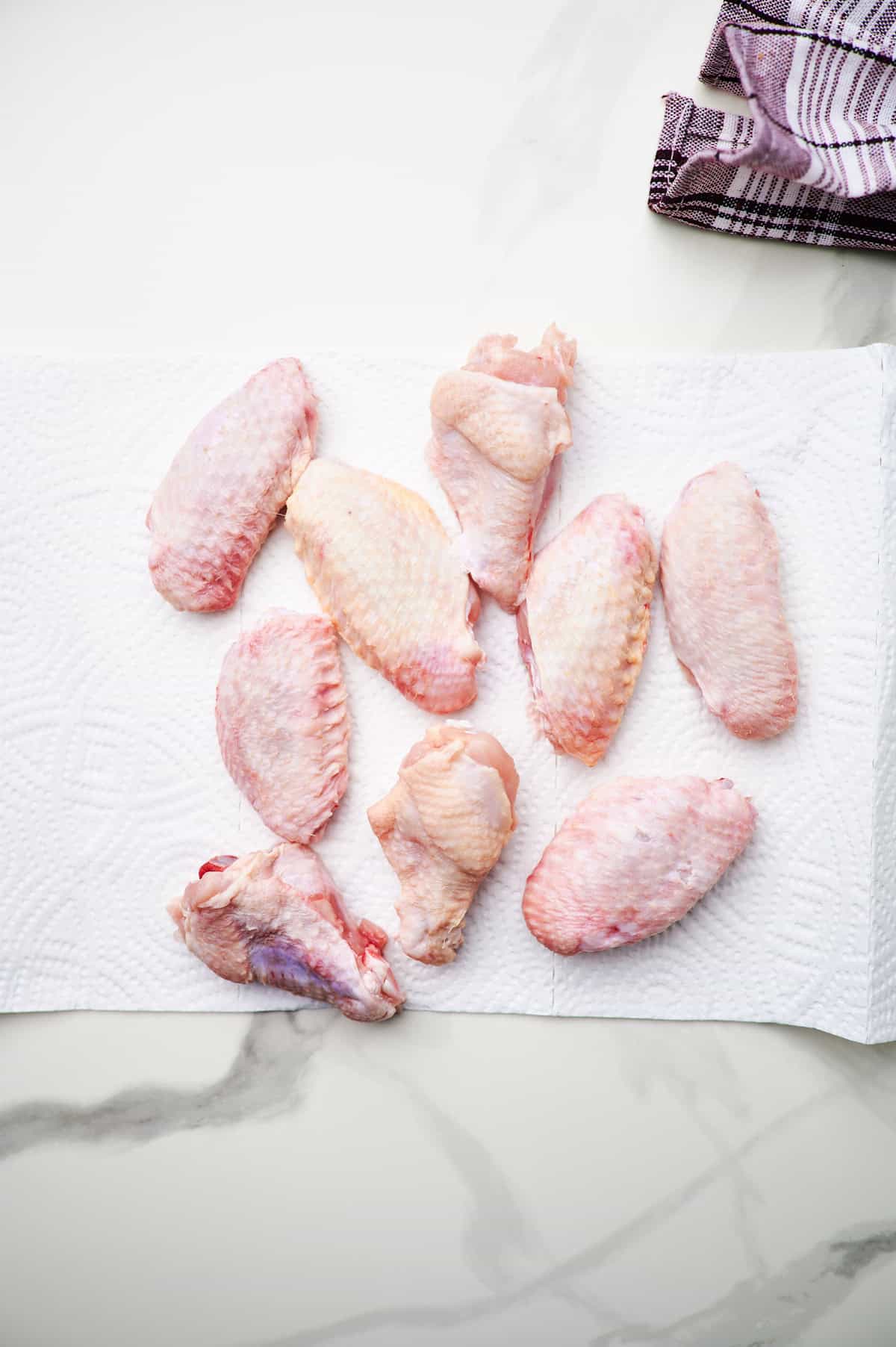 These crispy oven baked wings are so crispy, you will think they've been deep fried! You will be shocked how easy these are to make! 