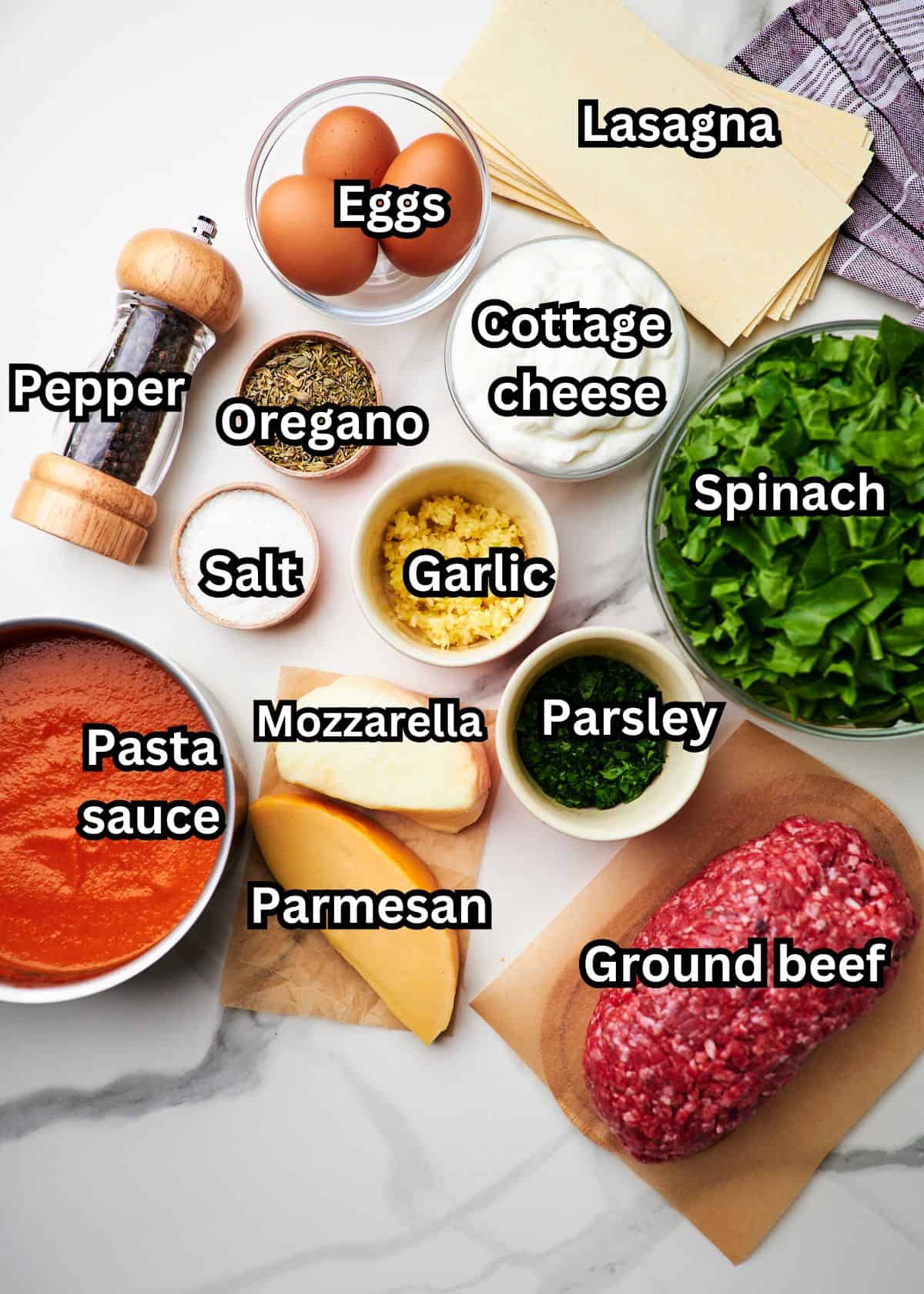 Bowls filled with ingredients to make homemade cottage cheese lasagna