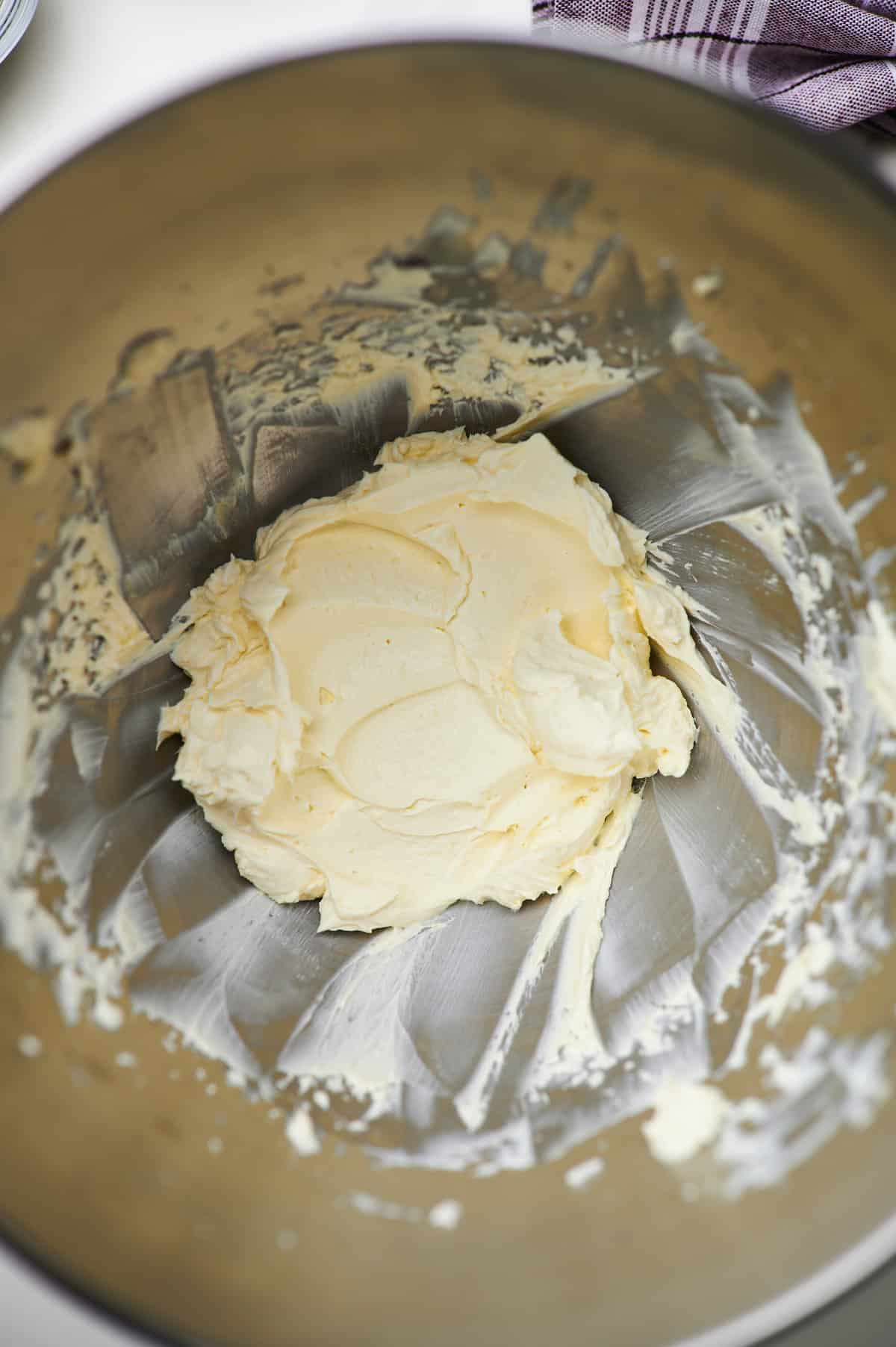 cream cheese and butter creamed together in a mixing bowl