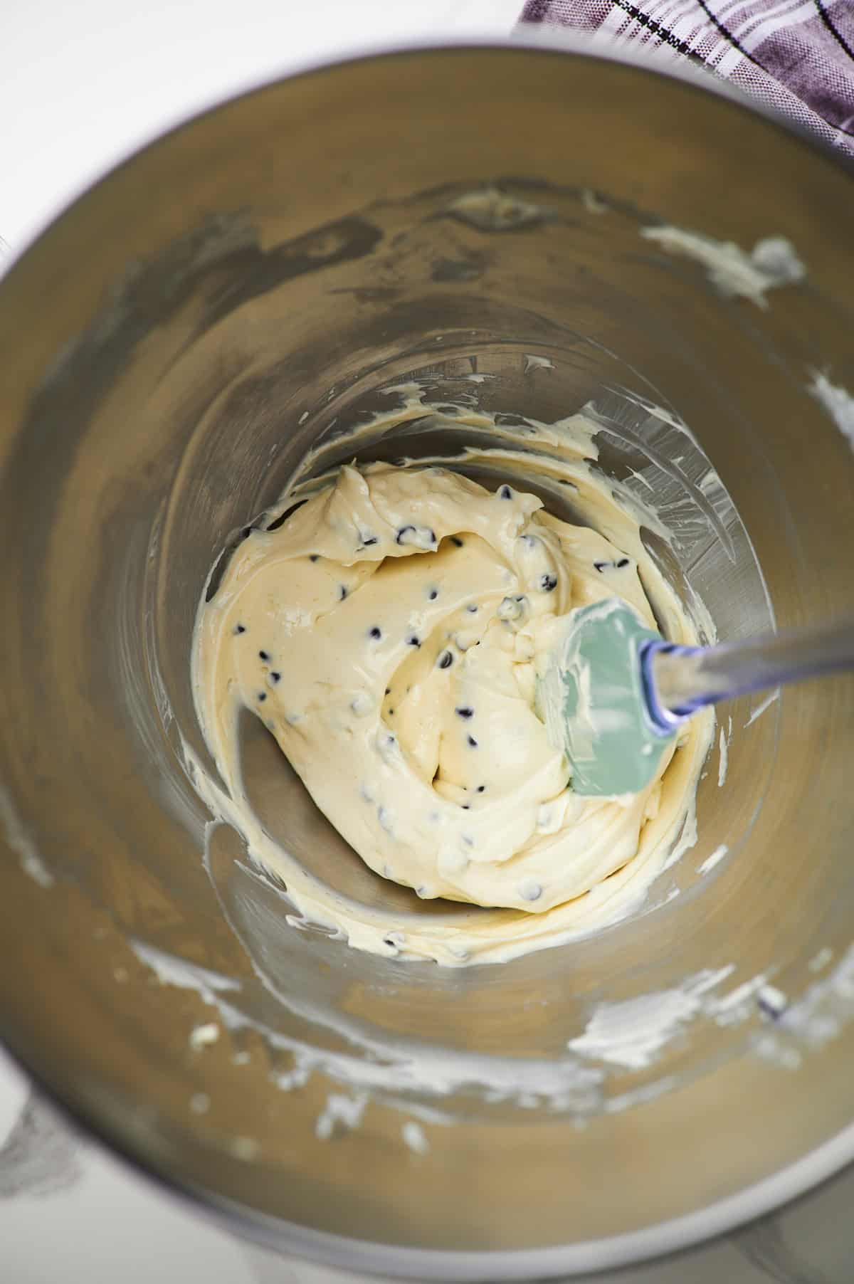 cream cheese dip with chocolate chips in a mixing bowl