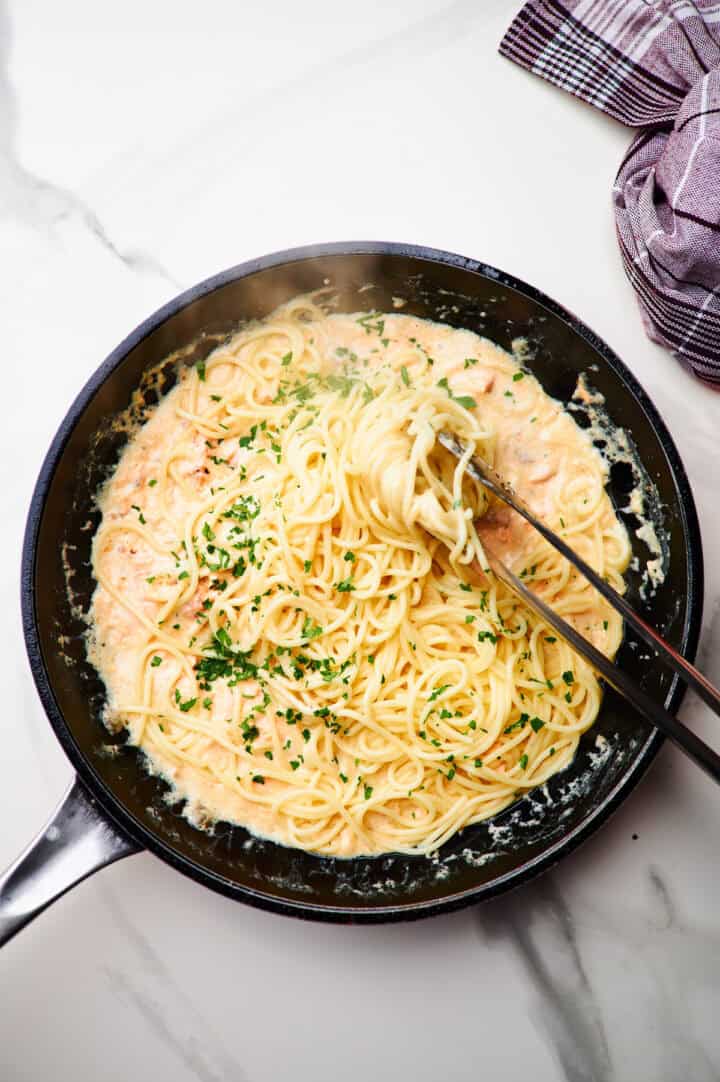 The BEST Salmon Pasta with a Creamy Garlic Sauce - Ambitious Foodie