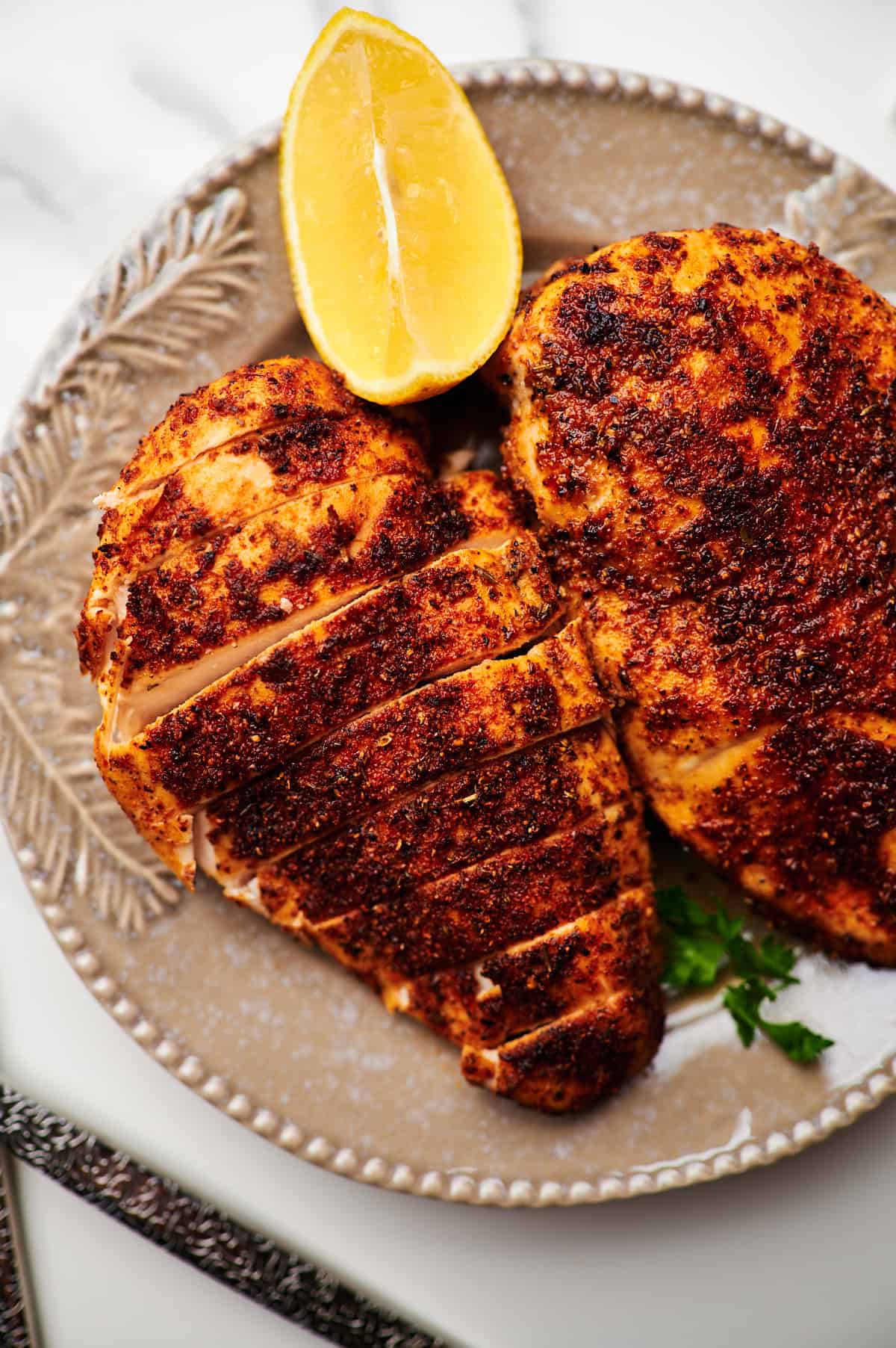 Overhead view of Air Fryer Chicken Breast on a serving plate.